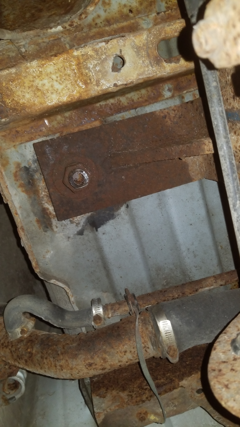 So the anchor threads into a hollow tube that is booked to this bracket. When these tubes were installed they were chrome. I was there for the install and I did put Anti-Seeze on the anchor, not on this time that is now the bane of my existence.